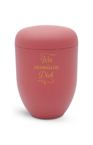Bio-Urne in rot mit goldenem Schriftzug wir vermissen dich