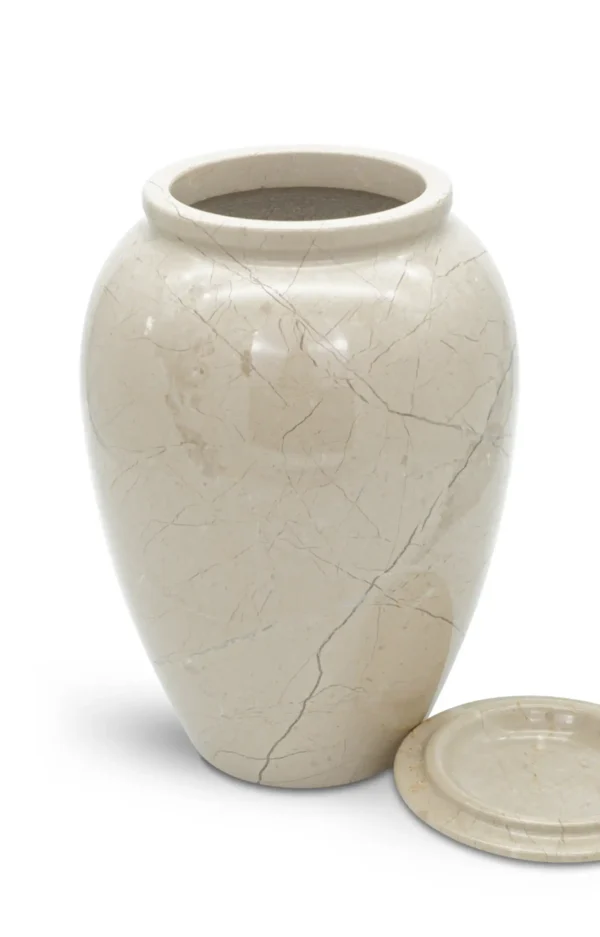 Marmorurne beige mit geöffnetem Deckel